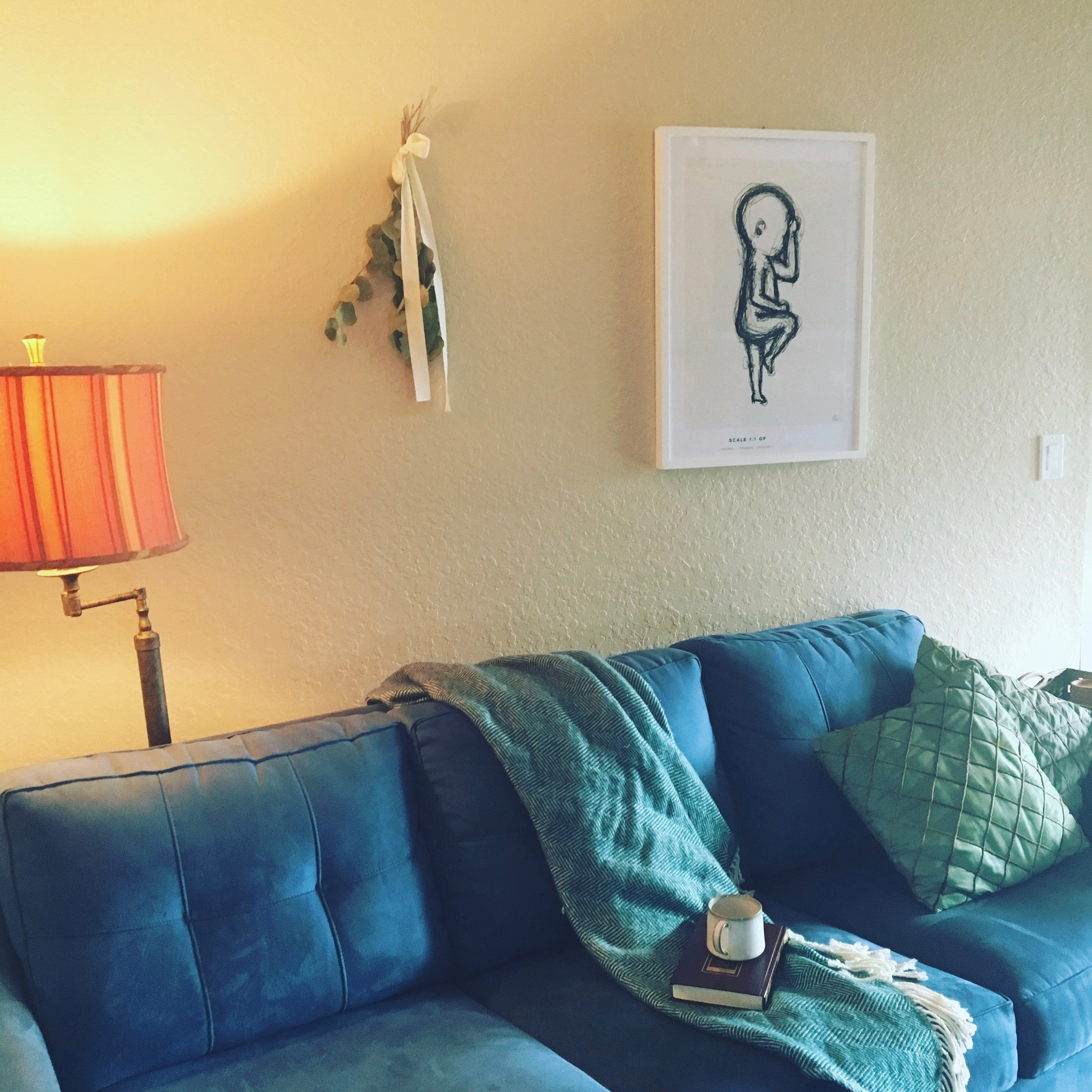 living room with birth poster